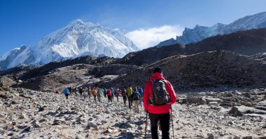 In this file photo, hopeful climbers hike toward the Mount Everest base camp, Nepal, May 11, 2017. (Alamy via Reuters)