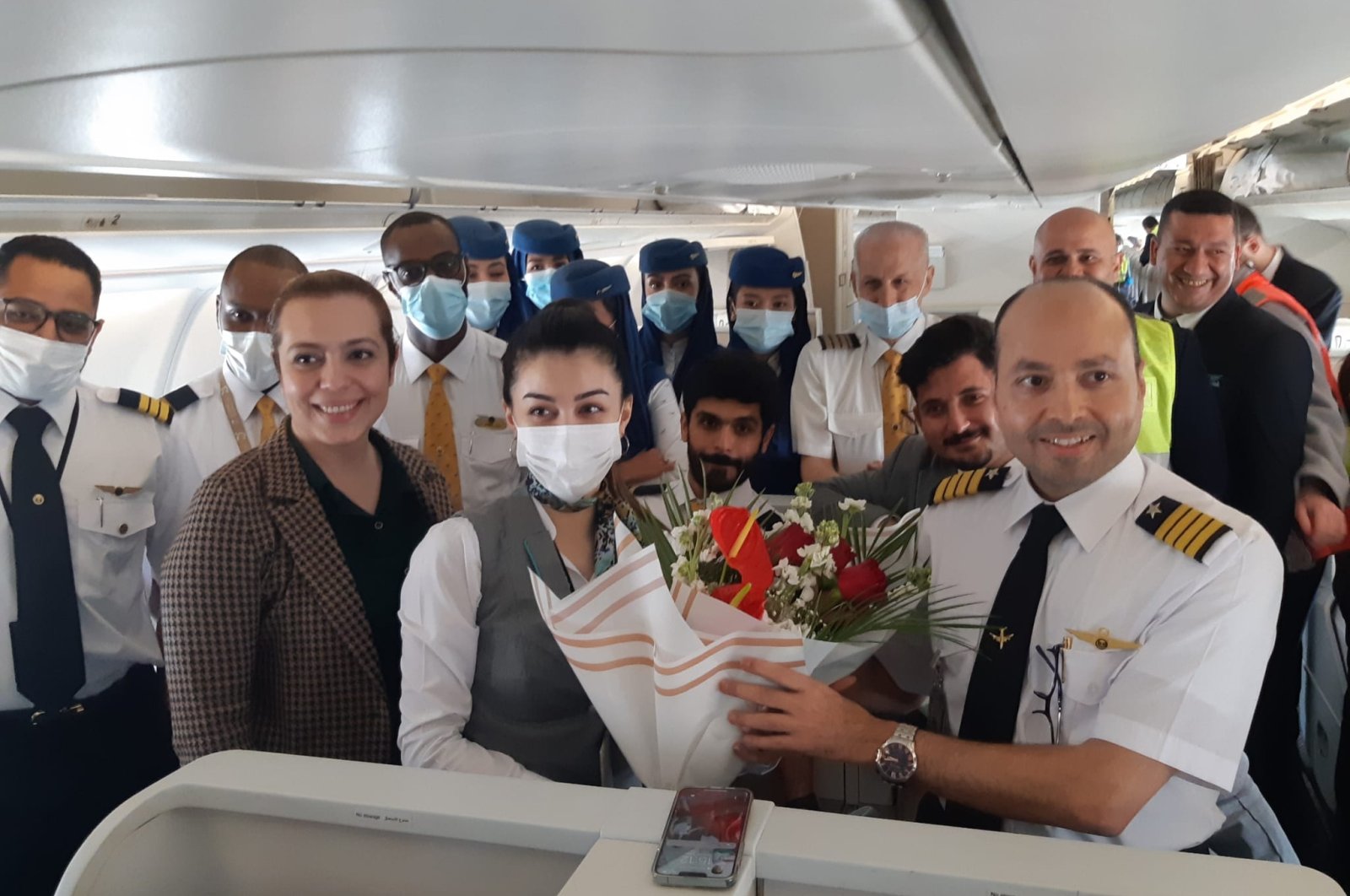 The cabin crew of Saudi Arabia&#039;s Saudia pose for a photo after landing at Istanbul Airport for the first time in two years due to a coronavirus hiatus, Istanbul, Turkey, May 7, 2022. (DHA Photo)