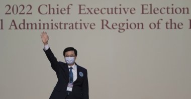 John Lee, former No. 2 official in Hong Kong and the only candidate for the city&#039;s top job, celebrates after declaring his victory in the chief executive election of Hong Kong in Hong Kong, May 8, 2022. (AP Photo)