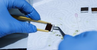 A team member works on wearable solar technology at the Yıldız Technical University, Istanbul, Turkey, April 26, 2022. (AA Photo)
