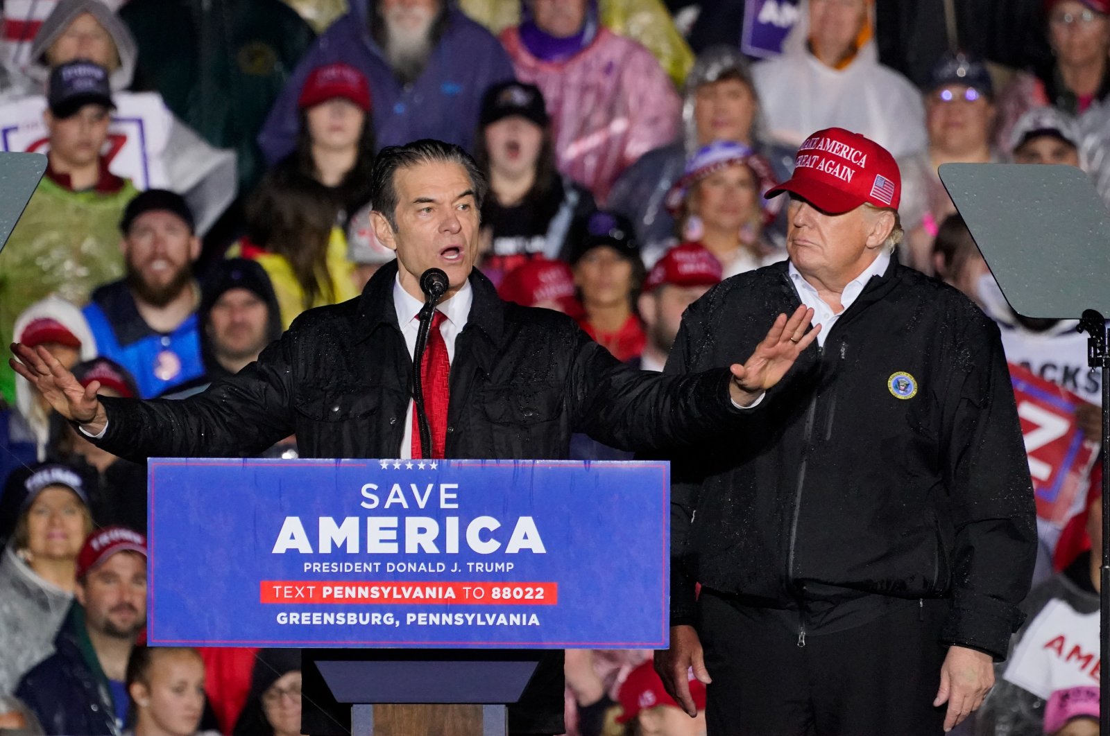 Pennsylvania Senate candidate Dr. Mehmet Oz (L) accompanied by former President Donald Trump, speaks at a campaign rally in Greensburg, Pa., U.S., May 6, 2022. (AP Photo)