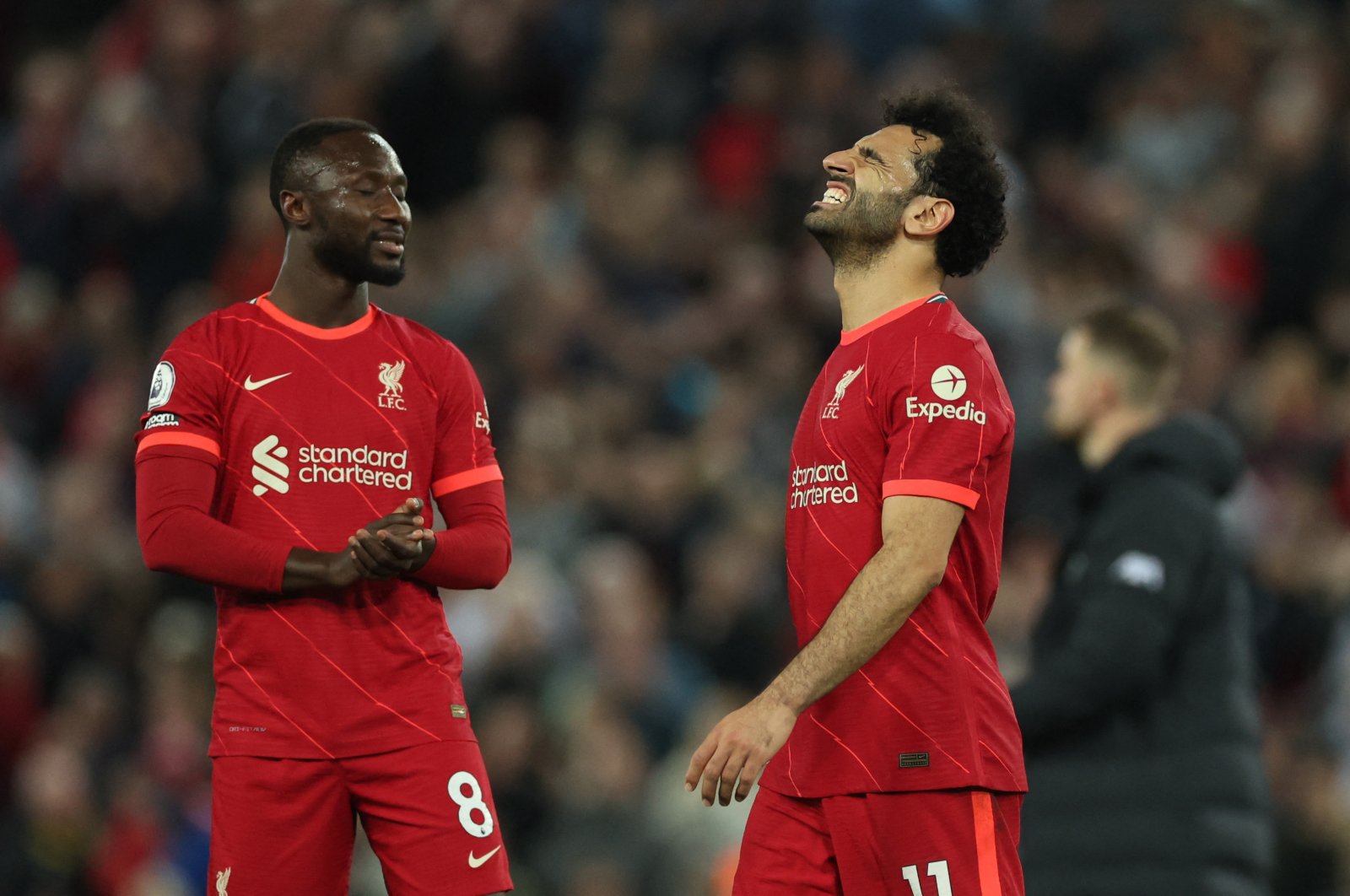 Liverpool&#039;s Mohamed Salah (R) and Naby Keita reacts after a Premier League match against Tottenham Hotspur, Liverpool, England, May 7, 2022. (Reuters Photo)