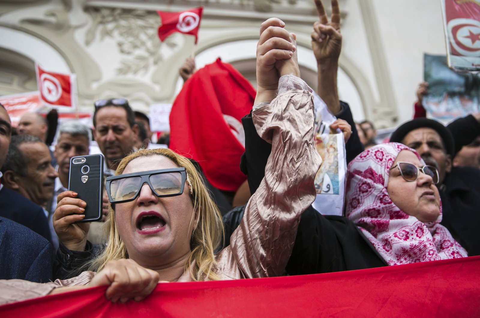 Tunisian demonstrators shout slogans during a rally in support of Tunisian President Kais Saied in Tunis, Tunisia, May 8, 2022. (AP Photo)