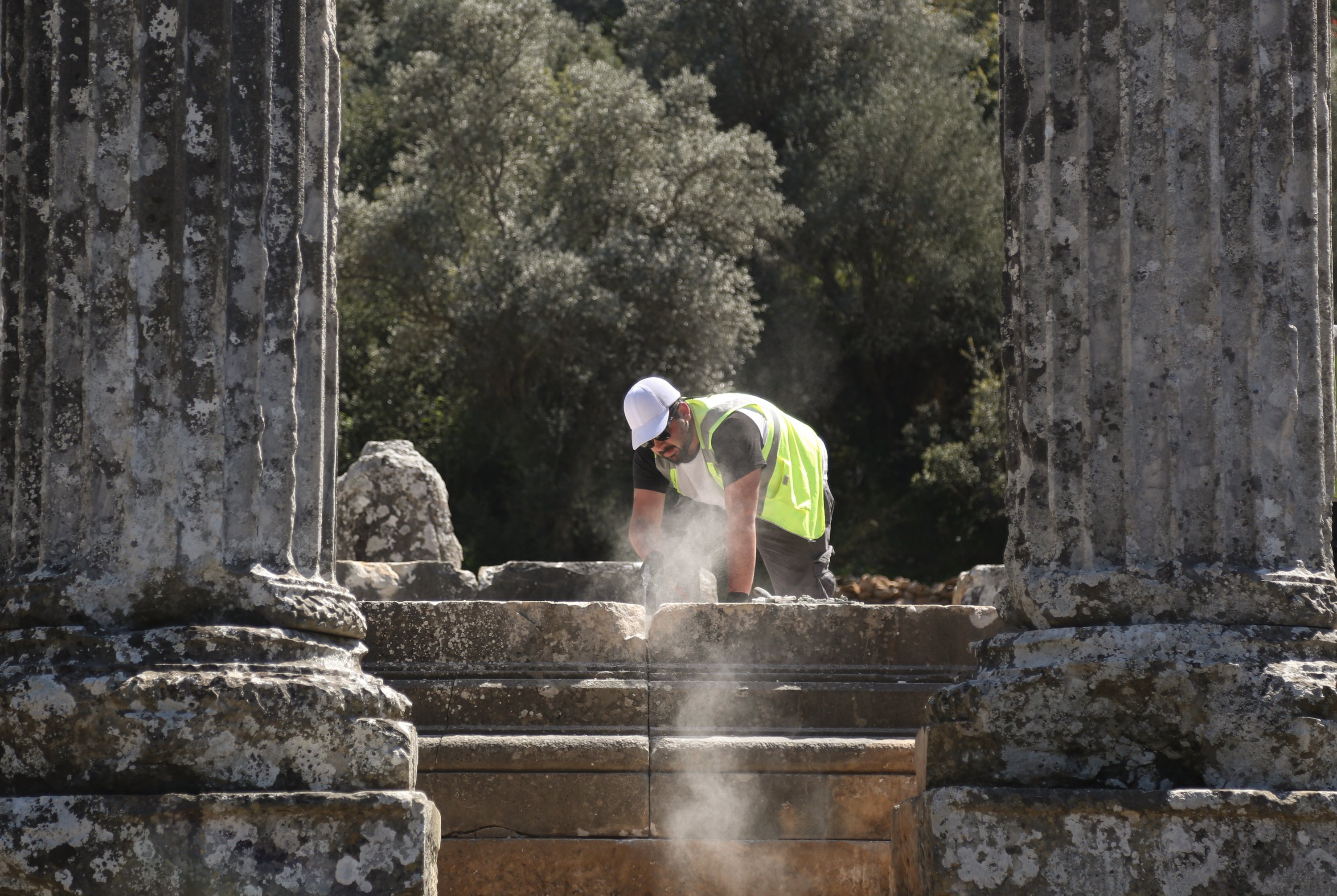 A restorer works at the Temple of Zeus Lipsinus, Euromos, Mugla, southwest Turkey, May 6, 2022. (AA Photo)