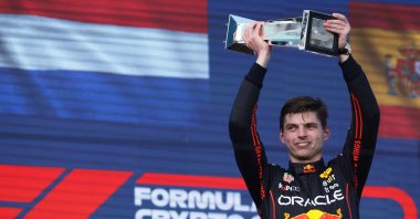 Max Verstappen celebrates on the podium after winning the F1 Miami Grand Prix, Miami, Florida, May 8, 2022. (AFP Photo)