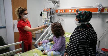 Zeynep and Bersa Bölen, patients with thalassemia, cling to life thanks to stem cells taken from their siblings, Malatya, east-central Turkey, April 28, 2022. (AA Photo)