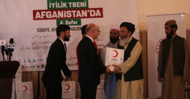 The Turkish Red Crescent distributed food aid to needy people in Kabul, Afghanistan, May 5, 2022. (AA Photo)