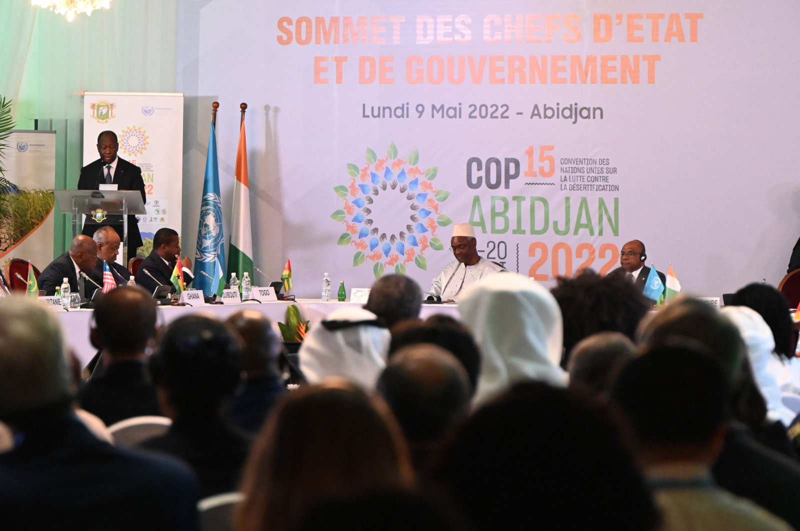 Ivorian President Alassane Ouattara (back L) speaks during the opening ceremony of the COP15 at the Sofitel Ivoire hotel in Abidjan, Ivory Coast, May 9, 2022. (AFP Photo)