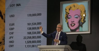 Christie's auctioneer ends the auction of "Shot Sage Blue Marilyn" by Andy Warhol for $170 million dollars during an Evening Sale of works from the Collection of Thomas and Doris Amman at Christie's Auction House in New York, U.S., May 9, 2022. (EPA Photo)