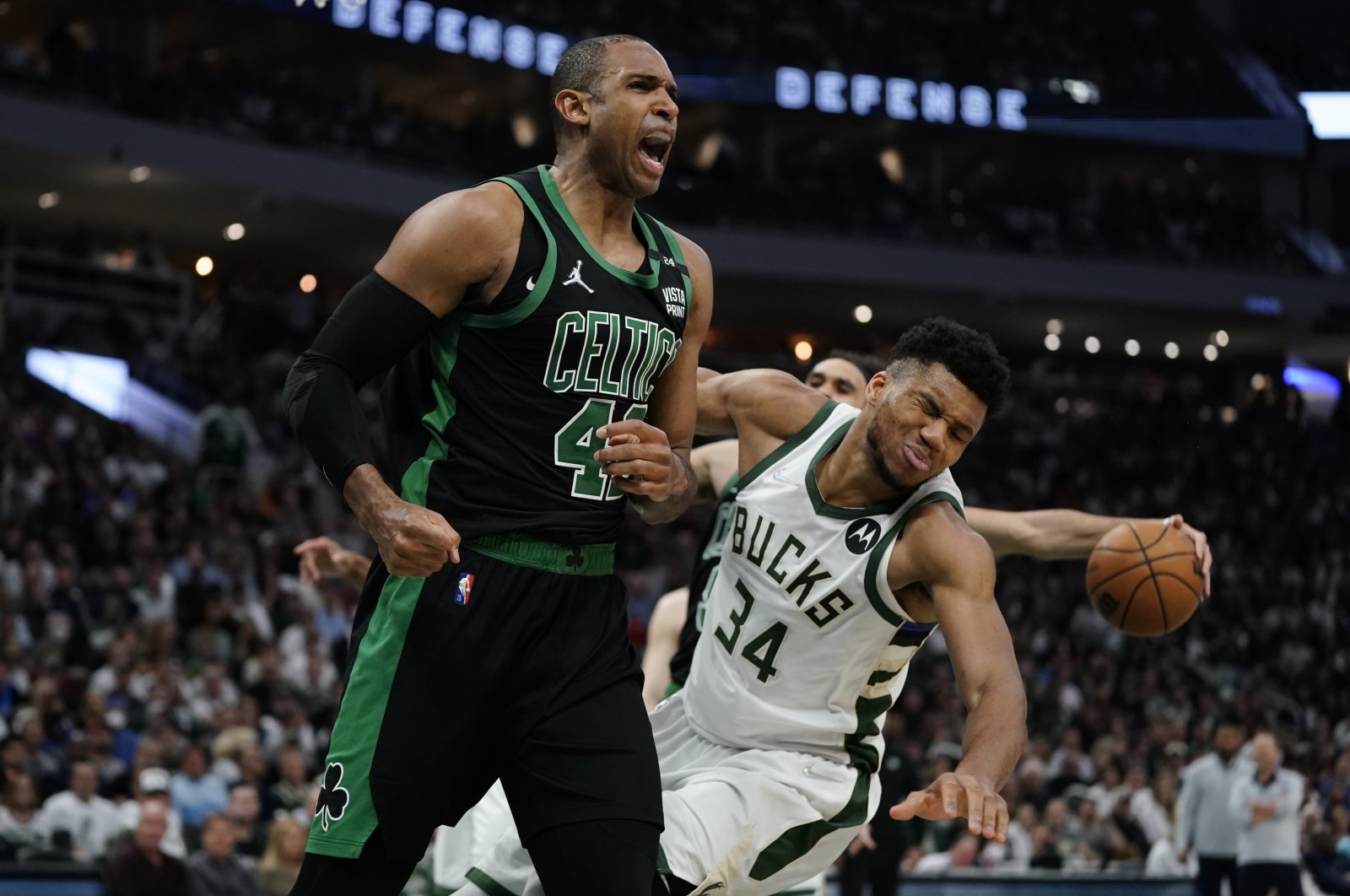 Celtics&#039; Al Horford (L) reacts in front of Bucks&#039; Giannis Antetokounmpo during an NBA playoffs game, Milwaukee, U.S., May 9, 2022. (AP Photo)