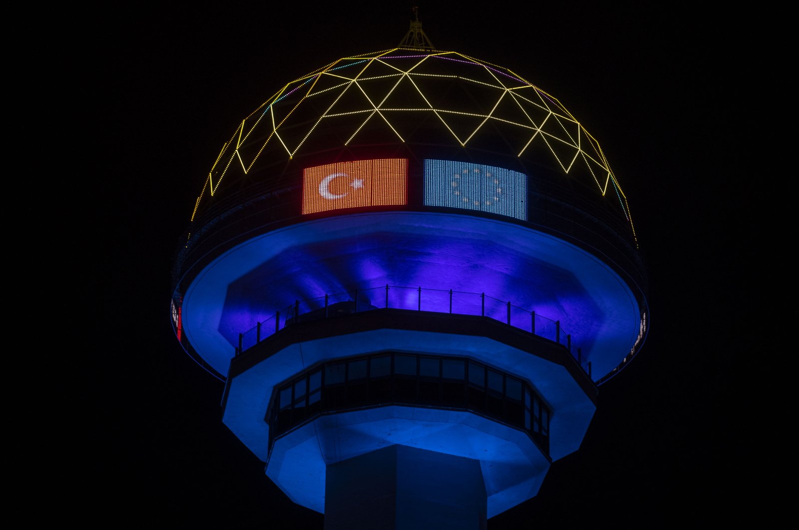The Atakule tower was lit with colors of the European Union on the occasion of Europe Day, Ankara, Turkey, May 9, 2022 (AA Photo)