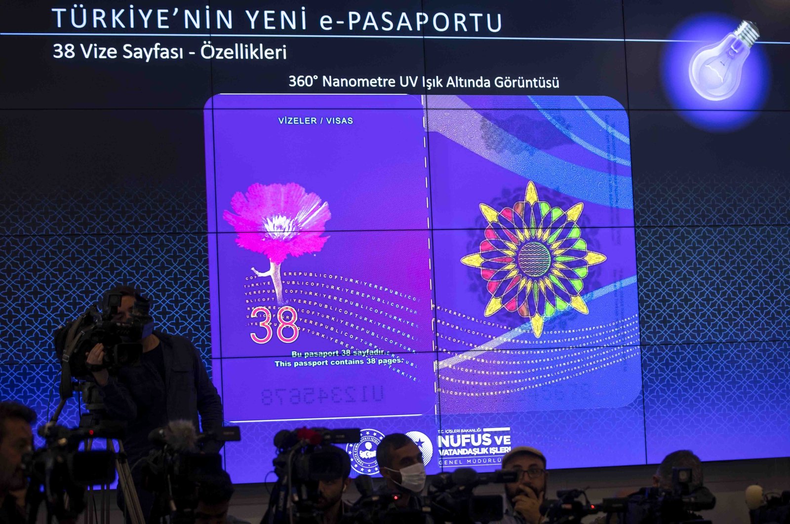 A view of the new Turkish passport projected onto a screen during the press conference, in the capital Ankara, Turkey, May 10, 2022. (AA PHOTO)