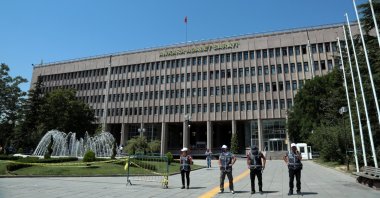 This file photo dated July 18, 2016, shows Turkish security officers standing outside Ankara Courthouse, where the capital's heavy penal courts are located. (AP Photo)