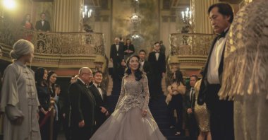 This image released by A24 shows Michelle Yeoh, (C), in a scene from &quot;Everything Everywhere All At Once.&quot; (AP)
