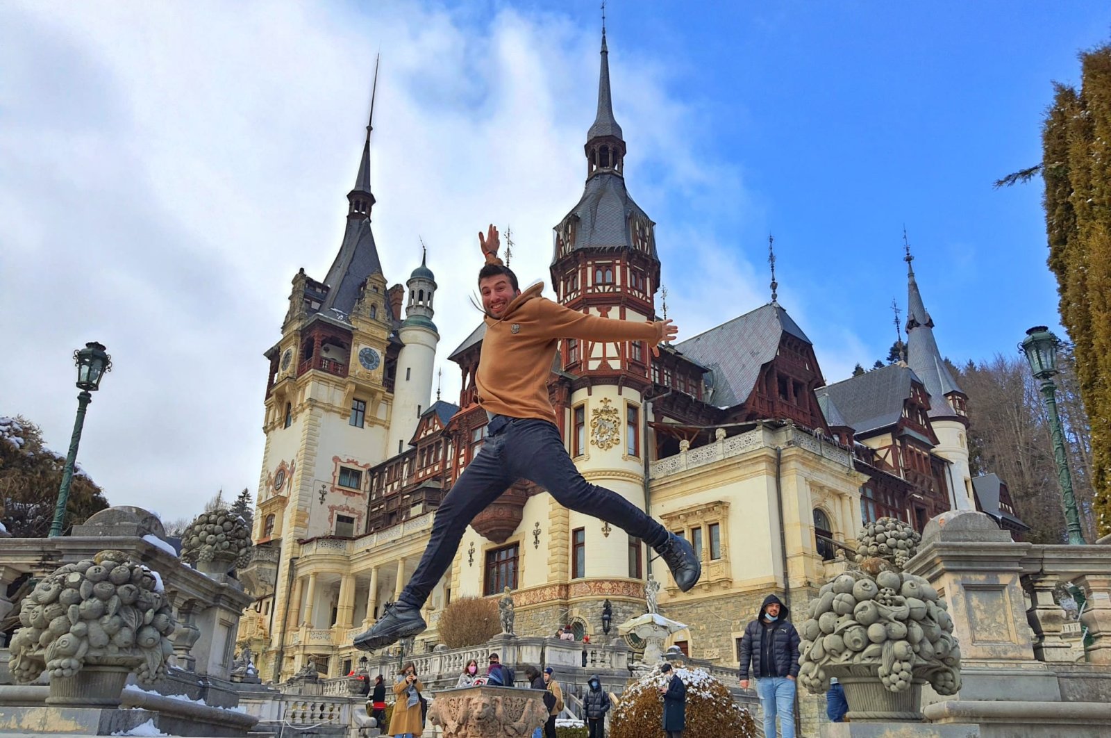 University student Erkan Orhan, 24, has visited 120 cities in 14 countries by hitchhiking, Sinaia, Romania, May 9, 2022. (DHA Photo)