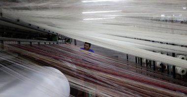 A worker is seen at a carpet factory in the southeastern province of Gaziantep, Turkey, May 10, 2022. (AA Photo)