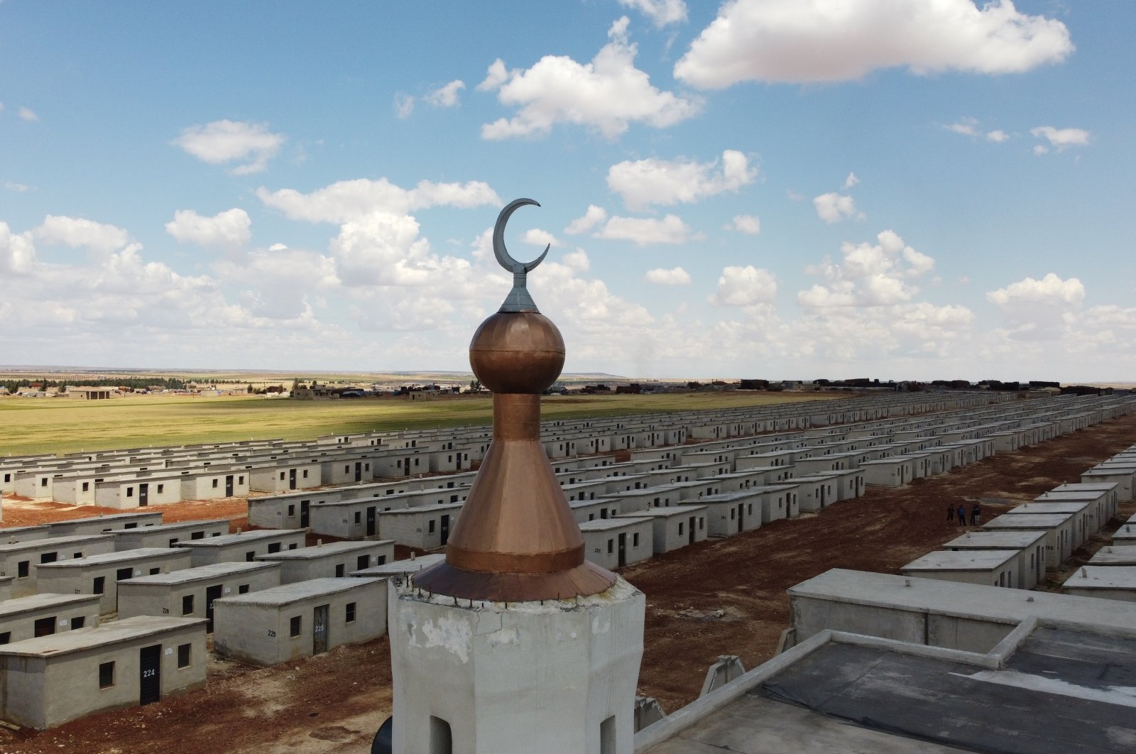 A general view of the briquette houses built by Turkey&#039;s international aid organizations and NGOs for war-weary Syrian people, in Idlib, northern Syria, May 11, 2022. (AA Photo)