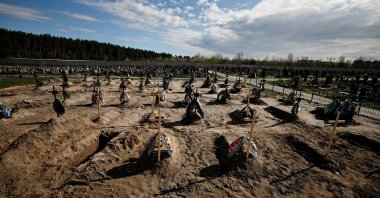 A view of new graves for people killed during Russia's invasion of Ukraine, at a cemetery in Bucha, Kyiv, Ukraine, April 28, 2022. (Reuters Photo)