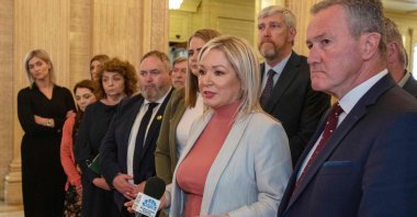 Northern Ireland's Deputy First Minister and Sinn Fein party leader Michelle O'Neill (C) and her Assembly team emerge from the chamber after the Democratic Unionist Party (DUP) failed to nominate a speaker, stopping the election of a first and deputy first minister, Stormont Estate, Belfast, Northern Ireland, on May 13, 2022. (AFP Photo)