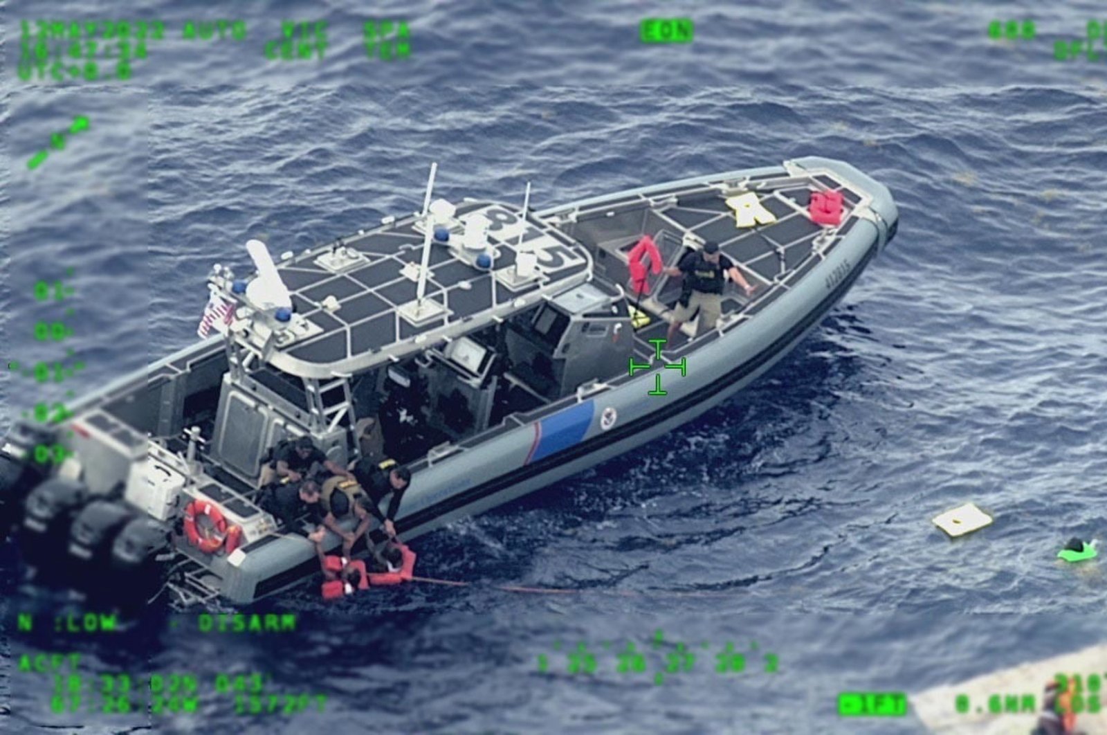 A handout photo shows U.S. Coast Guard air and surfaces rescue crews, Customs and Border Protection law enforcement boat crews and partner agencies respond to an unidentified amount of people in the water, Puerto Rico, May 12, 2022. (EPA Photo)