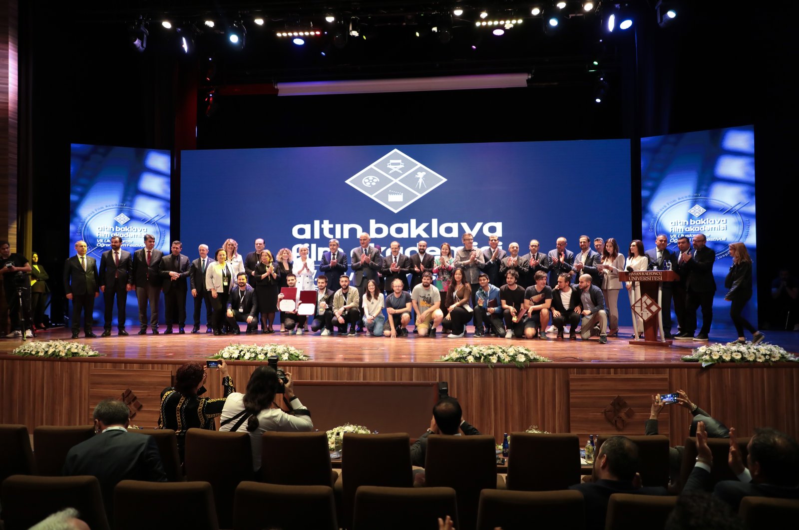 Award recipients and the festival team pose at the award ceremony of the festival, Gaziantep, southeastern Turkey, May 12, 2022.