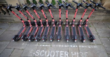 A row of Voi e-scooters is pictured in Liverpool, Britain, May 13, 2022. (Reuters Photo)
