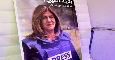 A picture of Al-Jazeera journalist Shireen Abu Akleh, who was killed by Israeli gunfire, is displayed in Al-Jazeera&#039;s headquarters in Doha, Qatar, May 11, 2022. (Reuters Photo)