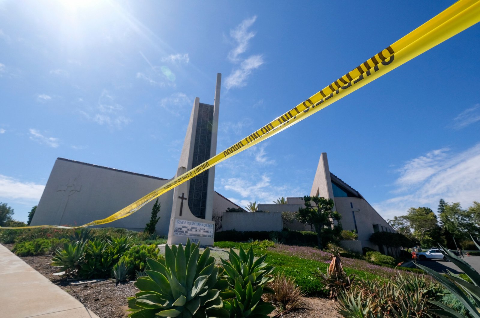 Police yellow tape is seen after a shooting inside Geneva Presbyterian Church in Laguna Woods, California, U.S., May 15, 2022. (AFP Photo)