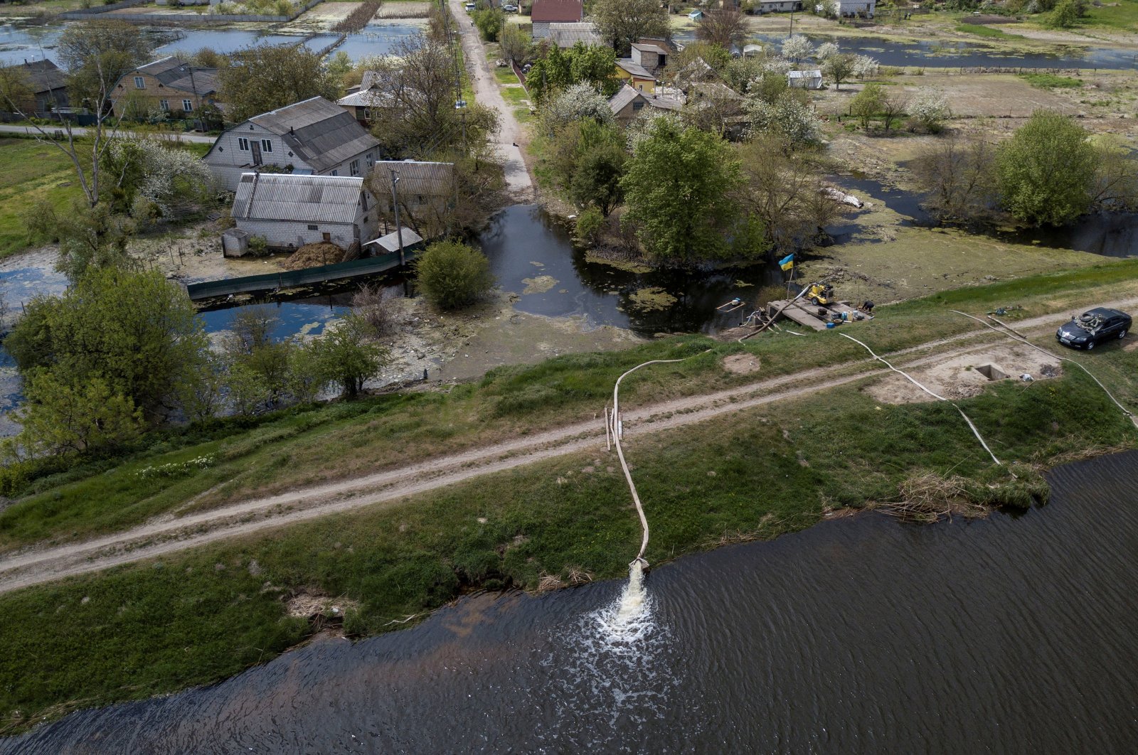 A water pump station is seen in a flooded area after Ukrainian military forces opened a dam to flood a residential area to stop Russian forces from advancing to the capital, Demydiv, Ukraine, May, 15, 2022. (Reuters Photo)