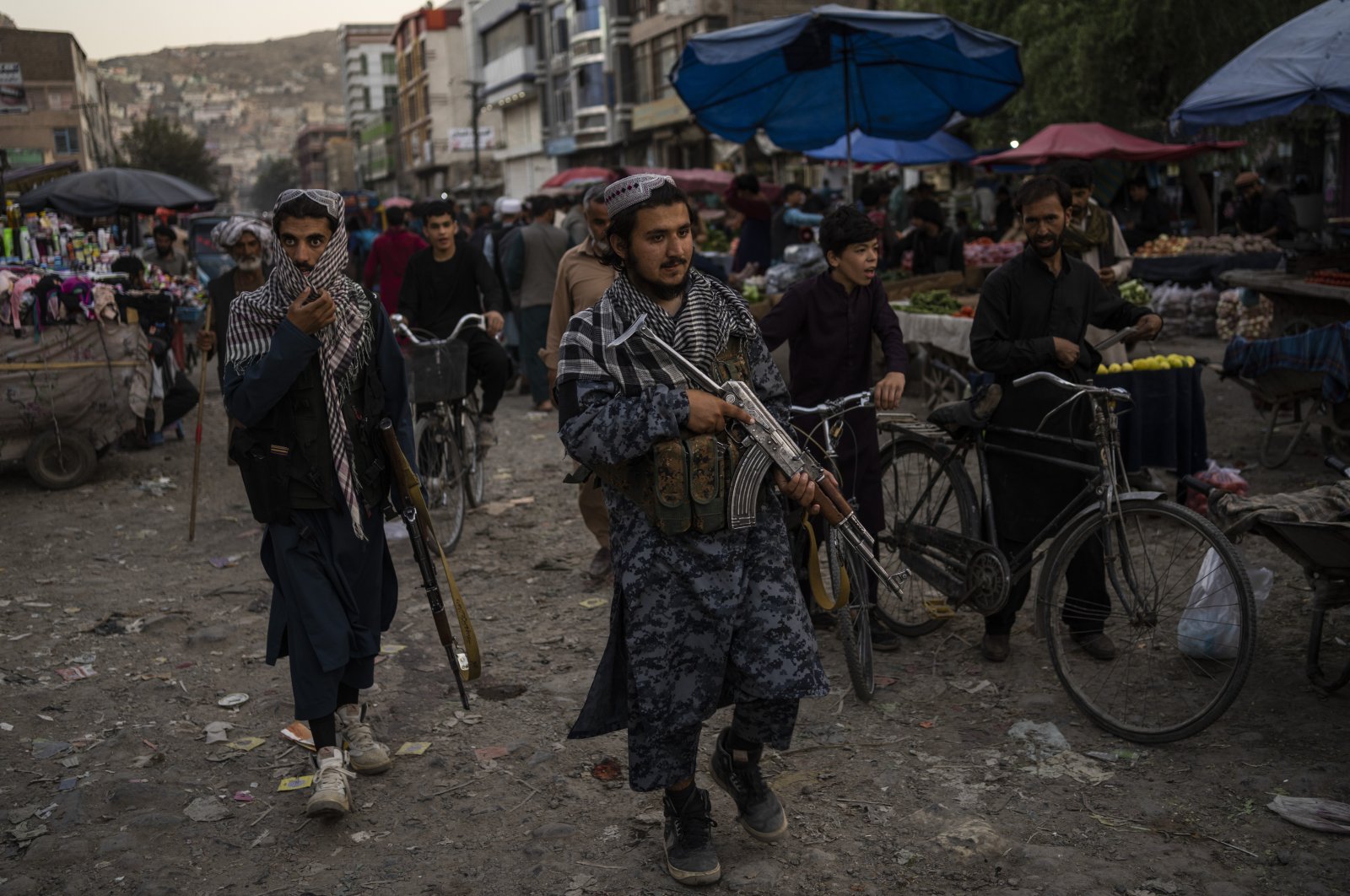 Taliban fighters patrol a market in Kabul&#039;s Old City, Afghanistan, Sept. 14, 2021. (AP Photo)