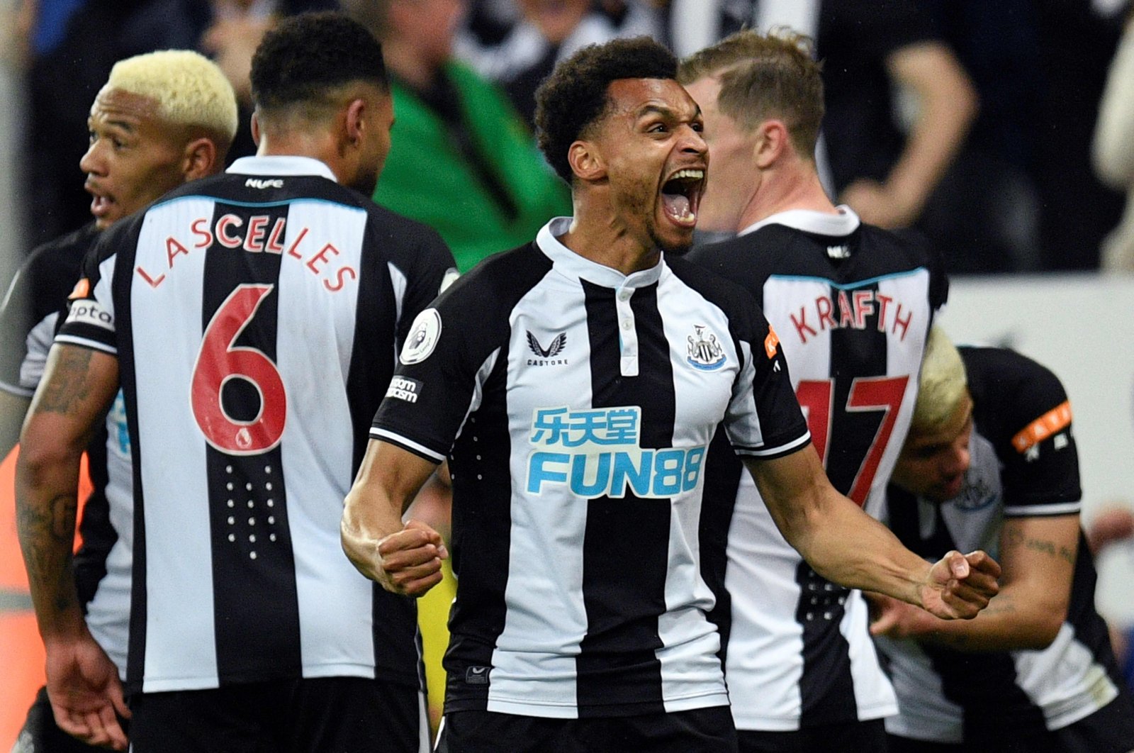 Newcastle United&#039;s Jacob Murphy celebrates after Newcastle United&#039;s Brazilian midfielder Bruno Guimaraes (R) scored the team&#039;s second goal in a English Premier League match vs. Arsenal, Newcastle, England, May 16, 2022. (AFP Photo)