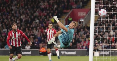 Southampton goalkeeper Alex McCarthy fails to stop a goal by Liverpool's Joel Matip (not pictured) during a Premier League football match at St. Mary's Stadium, Southampton, England, May 17, 2022. (AP Photo)