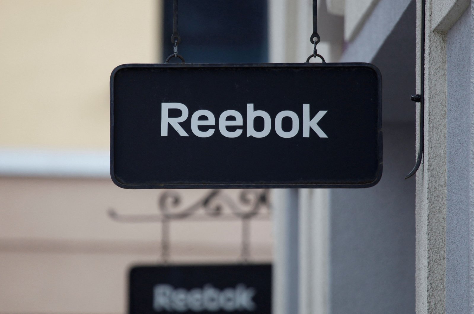 Boards with the Reebok store logo are seen on a shopping center at the outlet village Belaya Dacha outside Moscow, Russia, April 23, 2016. (Reuters Photo)