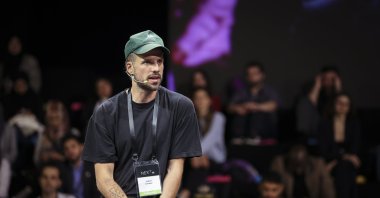 Hairdresser Joshua Coombes speaks at the panel "Building Back Together: Social Recovery Post-Pandemic" at the NEXT event organized by TRT World Forum, Istanbul, Turkey, May 14, 2022. (AA Photo)