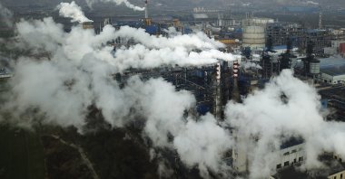 Smoke and steam rise from a coal processing plant in Hejin in central Shanxi Province, China, Nov. 28, 2019. (AP Photo)