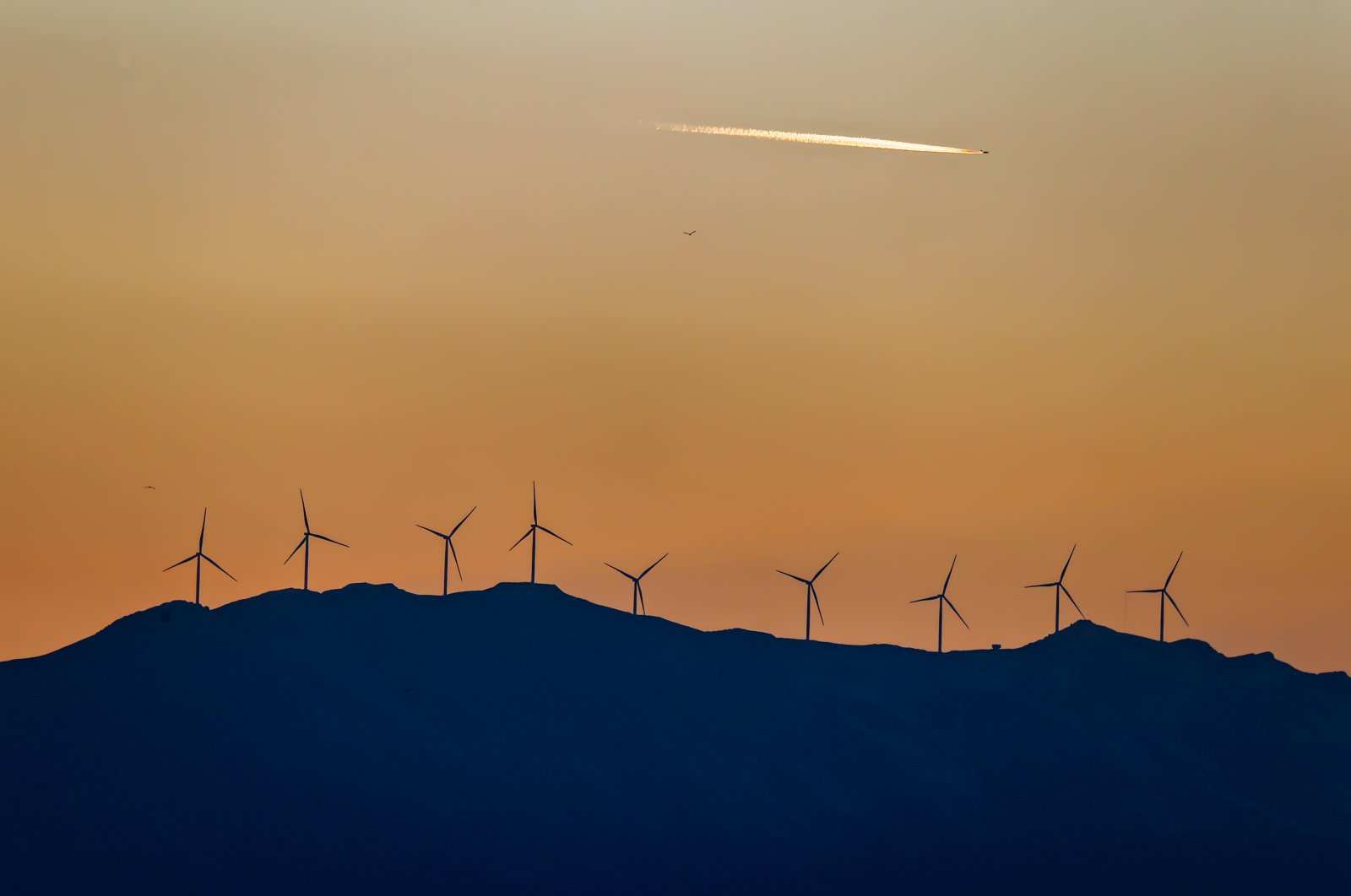 Wind turbines are seen in the Gevaş district of eastern Van province, Turkey, Nov. 16, 2021. (AA Photo)