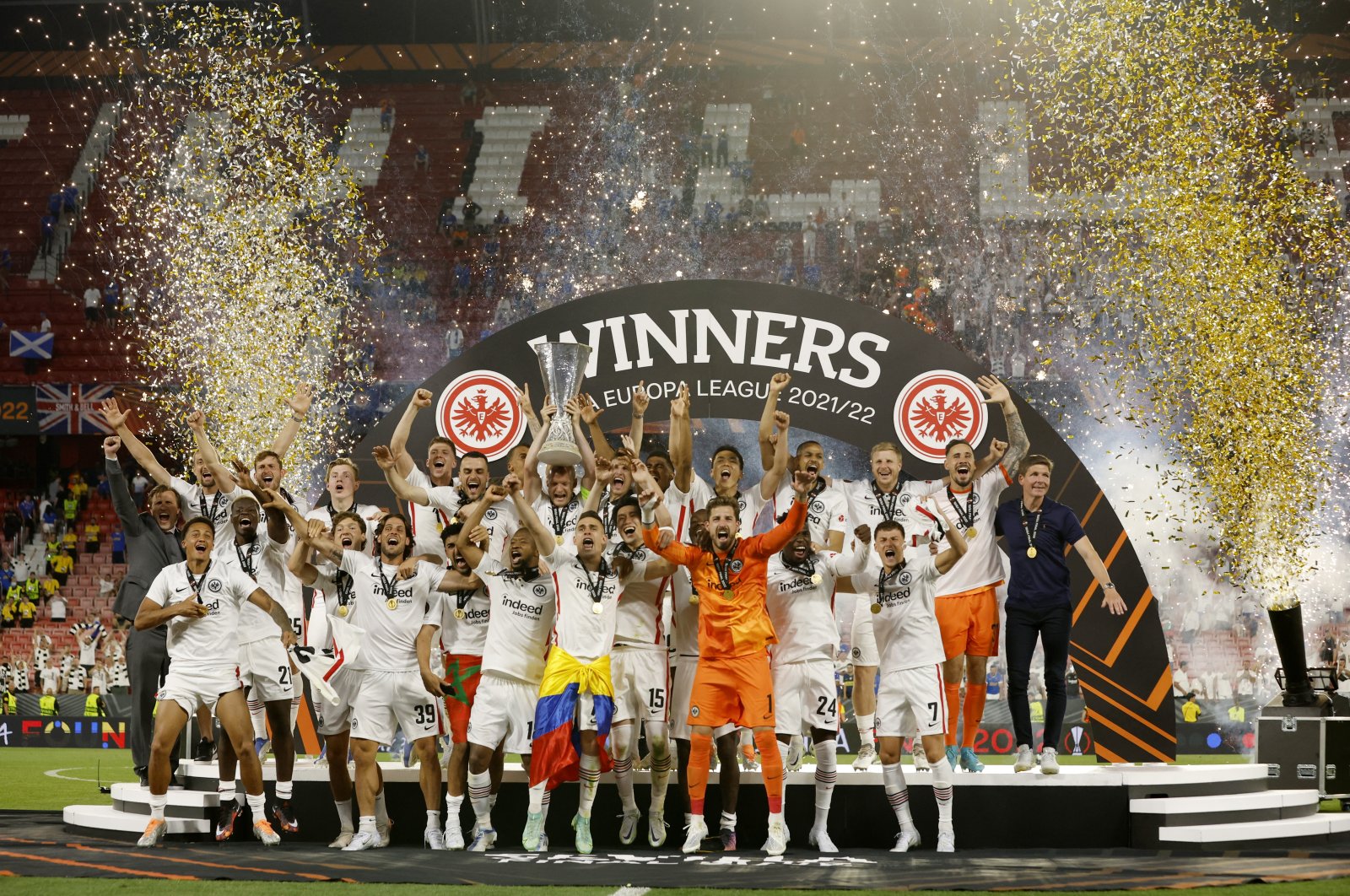 Eintracht Frankfurt&#039;s Sebastian Rode lifts the trophy as his team celebrates after winning the UEFA Europa League in the final match against Glasgow Rangers at the Ramon Sanchez Pizjuan Stadium in, Seville, Spain, on May 18, 2022. (Reuters Photo)