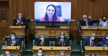 New Zealand Prime Minister Jacinda Ardern receives applause from colleagues after her address to parliament via a video link as she isolates herself at home after catching COVID-19 in Wellington, New Zealand, May 19, 2022. (AP Photo)