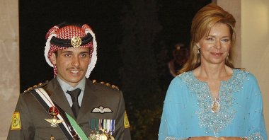 Then-Crown Prince Hamzah of Jordan (L) with his mother Queen Noor, during his wedding ceremony in Amman, Jordan, May 27, 2004. (AP Photo)