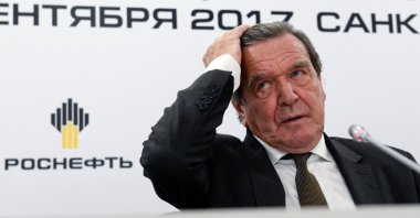 In this file photo taken on Sept. 29, 2017, former German Chancellor Gerhard Schroeder, then newly elected chairperson of the board of directors of Russia's oil giant Rosneft, reacts as he attends a briefing in Saint Petersburg, Russia. (AFP Photo)