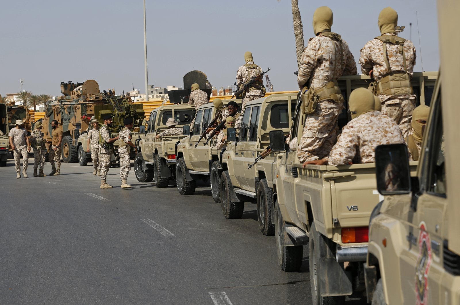 Forces loyal to interim Prime Minister Abdul Hamid Dbeibah, secure the streets of the capital, Tripoli, Libya, May, 17, 2022. (AP Photo)