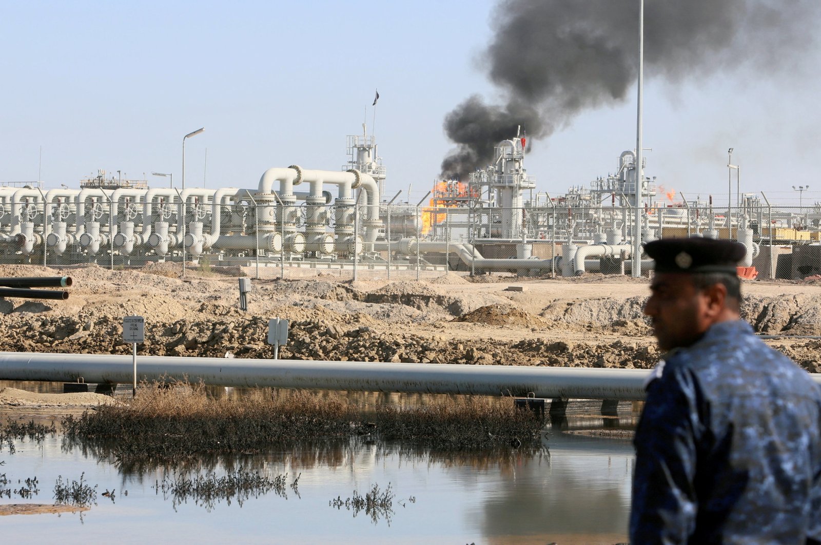 A police officer is seen at the West Qurna-1 oil field, which is operated by ExxonMobil, in Basra, Iraq, Jan. 9, 2020. (Reuters File Photo)