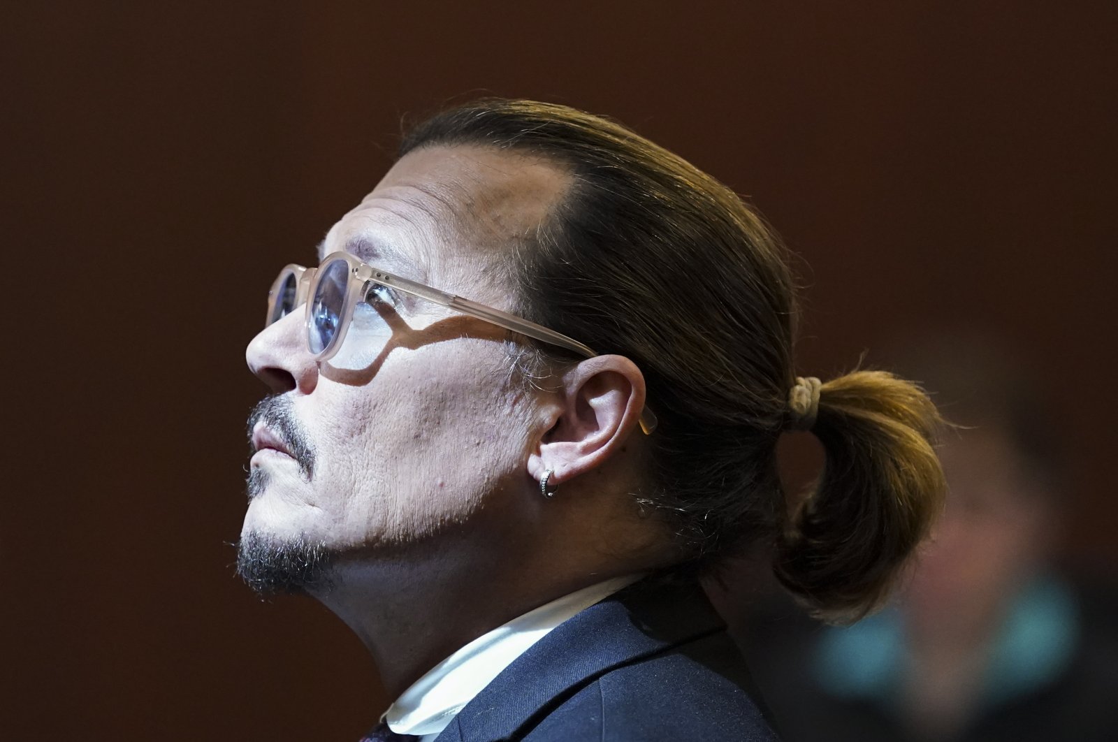 Actor Johnny Depp looks on during the defamation trial against ex-wife Amber Heard at the Fairfax County Circuit Courthouse in Fairfax, Virginia, U.S., May 18, 2022. (EPA Photo)