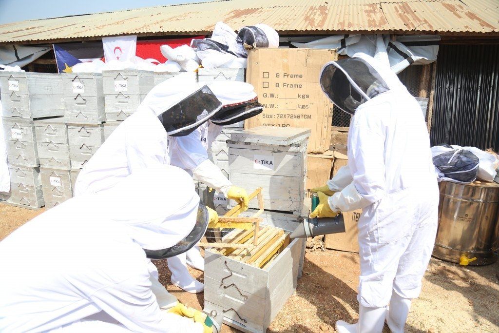 TİKA staff delivers beekeeping equipment and hives to South Sudanese people, in Juba, South Sudan, Jan. 18, 2021. (COURTEST OF TİKA)