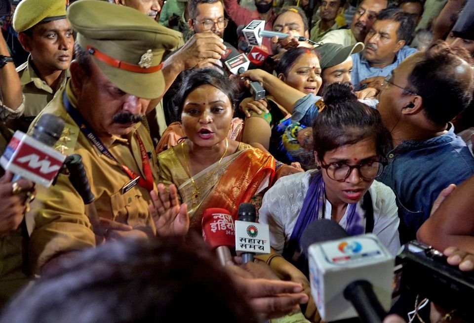 Rakhi Singh, Sita Sahu and Laxmi Devi, three of the five petitioners who filed a plea to pray every day before the idol of a goddess and relics inside the Gyanvapi mosque, speak with the media after they leave the mosque in Varanasi, India, May 14, 2022. (Reuters Photo)