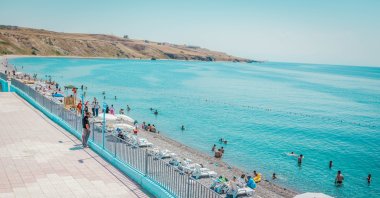 A view of Mollakasım, a Blue Flag beach, in Van, eastern Turkey, July 18, 2018. (PHOTO BY HATİCE ÇINAR)
