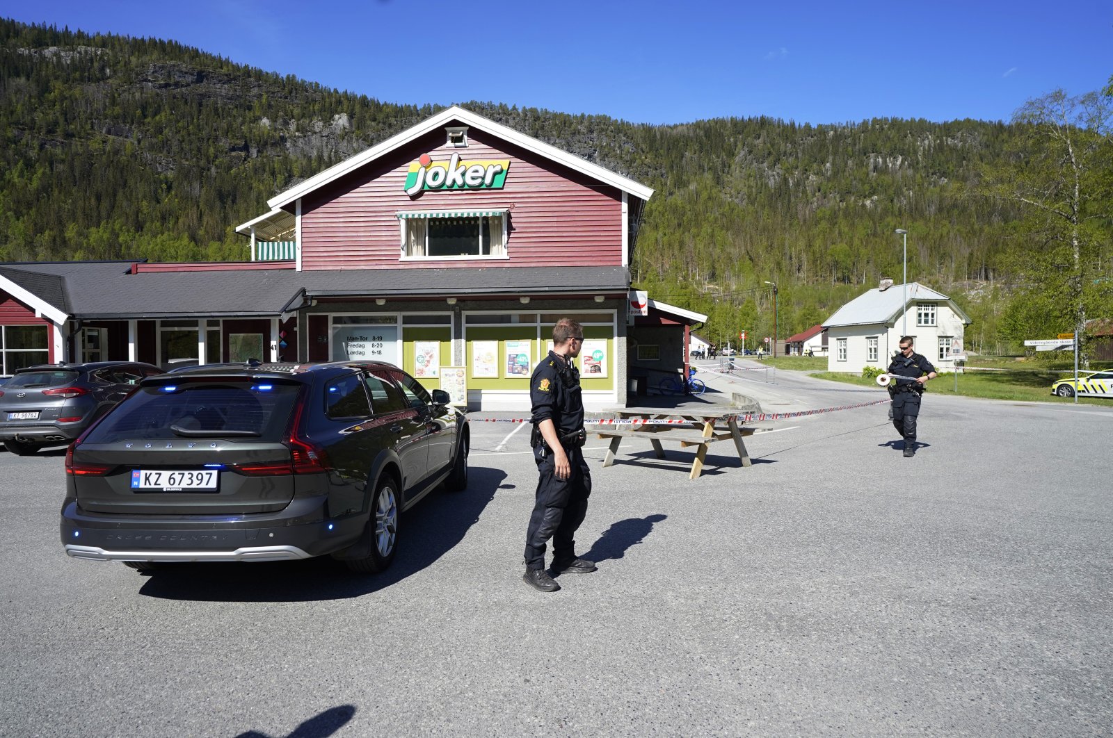 Police officers work on the scene of a multiple stabbing in Nore, Norway, May 20, 2022. (AP Photo)