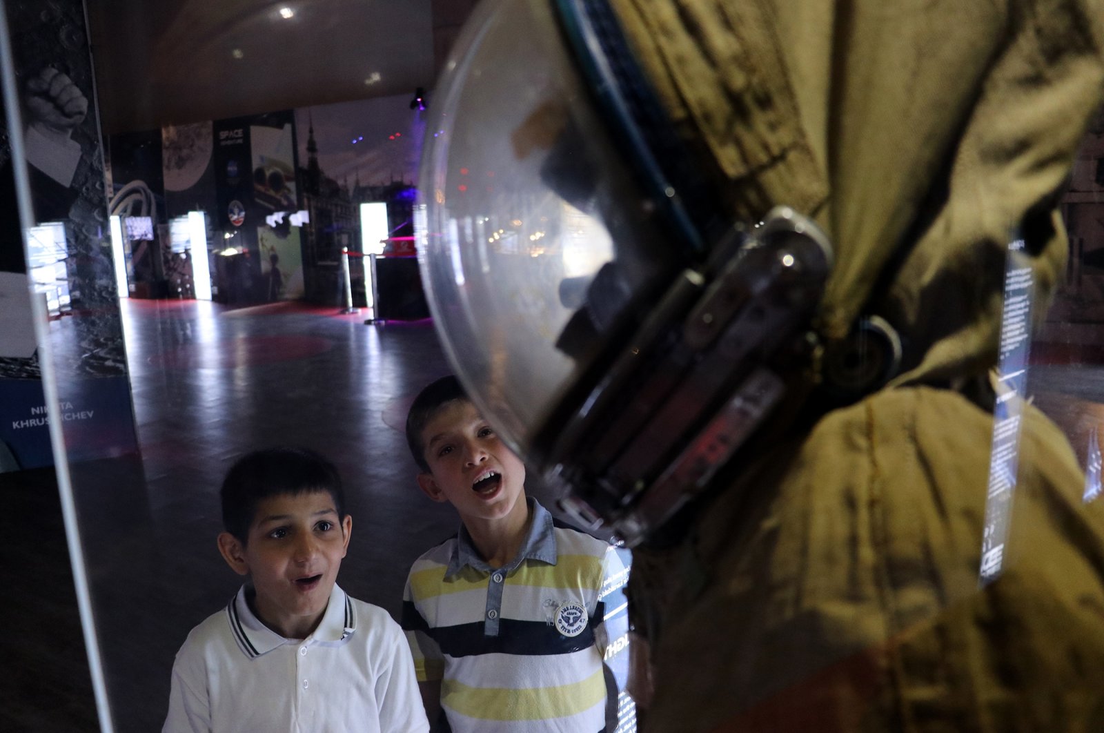 Children look at exhibits as part of &quot;Space Adventure Exhibition&quot; showcasing NASA&#039;s space journeys over 50 years, in Gaziantep, Turkey, May 19, 2022. (AA Photo)