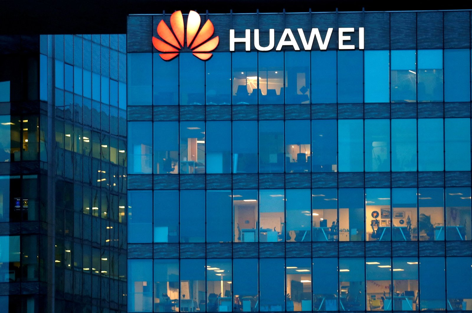 A view shows a Huawei logo at Huawei Technologies France headquarters in Boulogne-Billancourt near Paris, France, Feb. 17, 2021. (Reuters Photo)