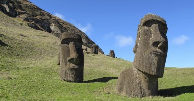 Statues of heads known as &quot;moais&quot; stand at Rano Raraku, the quarry on Easter Island or Rapa Nui, Chile, August 2012. Chile announced on May 20, 2022, the progressive reopening of Rapa Nui, the mysterious island of moai located in the middle of the Pacific Ocean, after almost two years of closure to protect it from the COVID-19 pandemic. (AP File Photo)